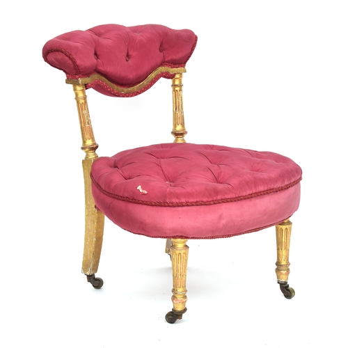 622 - A 19th century French giltwood and button upholstered bedroom chair, upholstered curved rail on flut... 