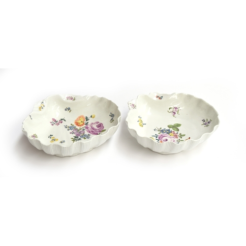 187 - A pair of large 19th century Meissen dishes of scallop shell form, the interior hand painted with fl... 