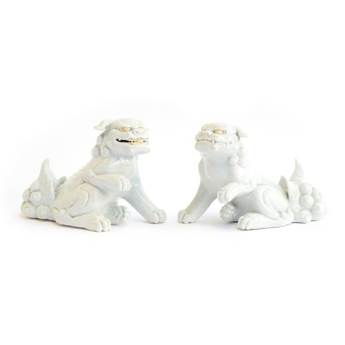 158 - A pair of Japanese Meiji era Hirado porcelain shishi dogs/lions, with incised detail, each 15cm high