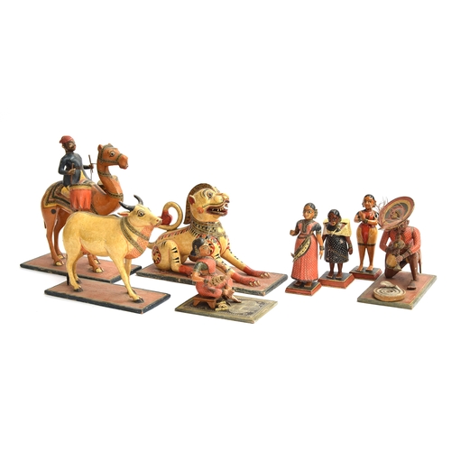 174 - A collection of eight late 19th/early 20th century Indian painted papier mache folk art toys in the ... 