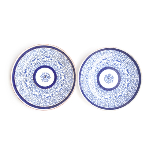 191 - A pair of late 18th century Royal Worcester 'Blue Lily' pattern dishes, each bearing a puce retailer... 