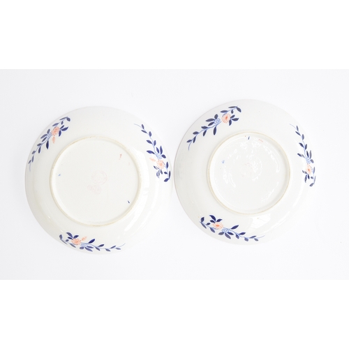 191 - A pair of late 18th century Royal Worcester 'Blue Lily' pattern dishes, each bearing a puce retailer... 