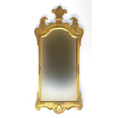 393 - A George II style giltwood wall mirror, 20th century, the cresting centred by three feathers and fla... 