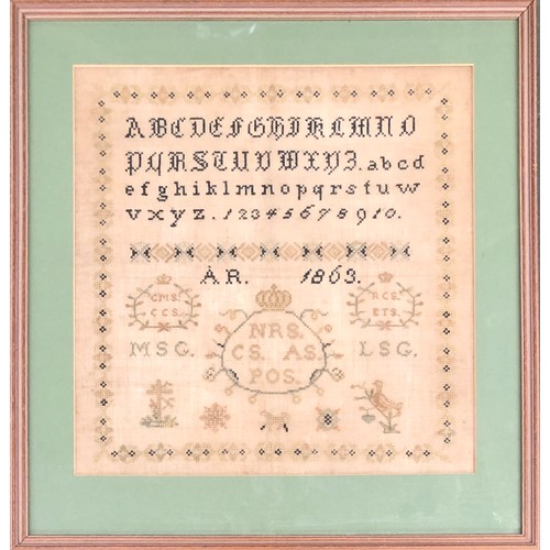 230 - A Victorian alphabet sampler, monogrammed A.R 1863, with crowned monograms, bird and a dog detail, 3... 