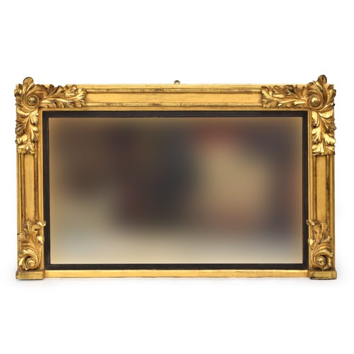 389 - A Victorian carved giltwood overmantel mirror, applied carved acanthus leaves, the plate within a re... 