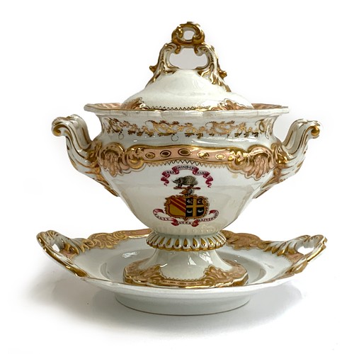 186 - A 19th century footed tureen and cover, with stand, bearing hand painted armorial crest of a porcupi... 