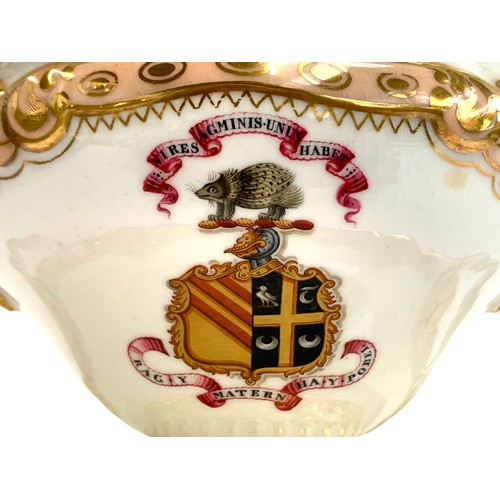 186 - A 19th century footed tureen and cover, with stand, bearing hand painted armorial crest of a porcupi... 