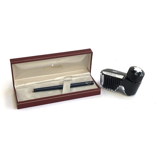 323 - A Sheaffer TRZ model 62 medium fountain pen, cased; together with a bottle of Mont Blanc ink pot