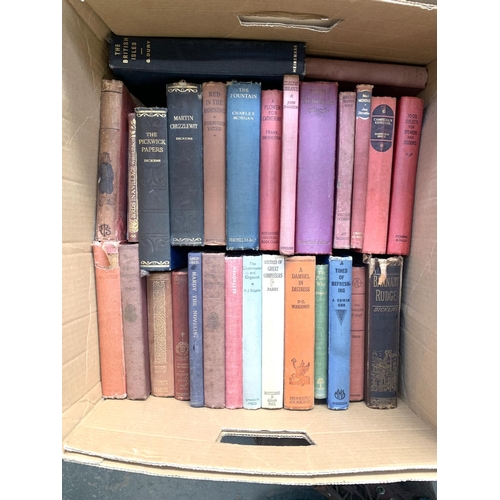 328 - Two mixed boxes of hardback books to include Dickens, P.G Wodehouse, Emily Bronte etc