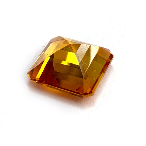 34 - A large unmounted faceted square cut orange sapphire, 1.4x1.4x0.75, approx. 13ct, 2.9g