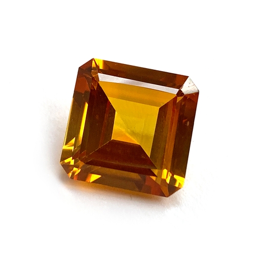 34 - A large unmounted faceted square cut orange sapphire, 1.4x1.4x0.75, approx. 13ct, 2.9g