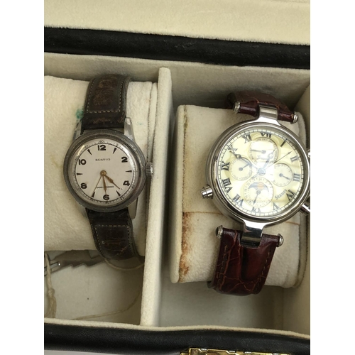 66 - A lot of five gent's wrist watches, to include Benrus, Timex, Stauer, and MSF (5)