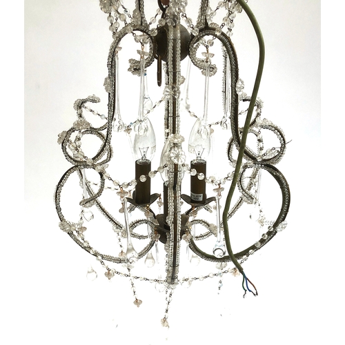 244 - A glass drop chandelier af, approx. 50cmL; together with two others