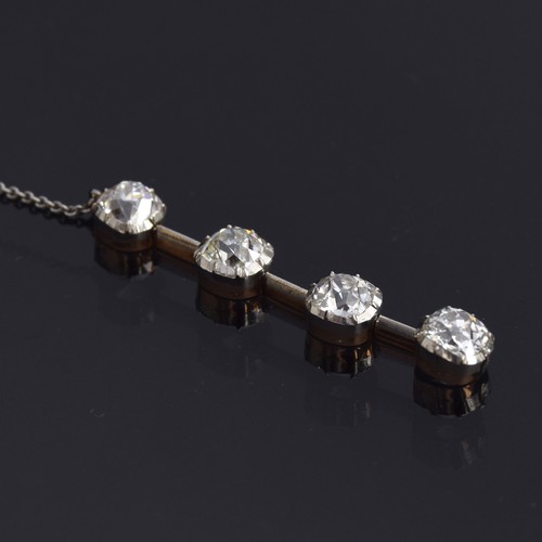 17 - Four old cut diamonds mounted in platinum and gold, currently in pendant form (af)

Provenance: the ...