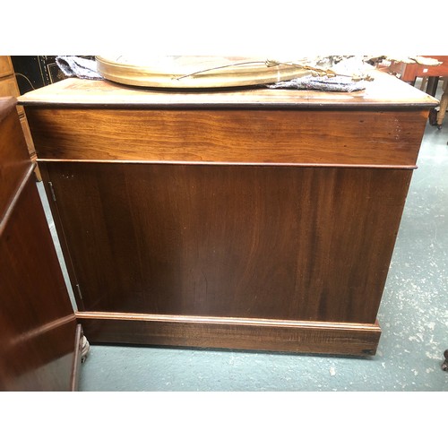 576 - A Victorian mahogany pedestal partner's desk, c.1880, with leather inset top above the three frieze ... 