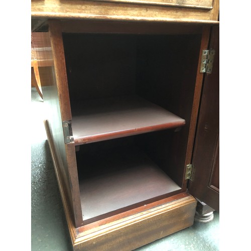 576 - A Victorian mahogany pedestal partner's desk, c.1880, with leather inset top above the three frieze ... 