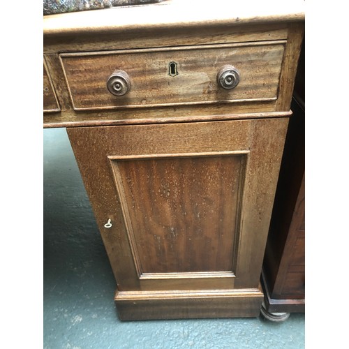 576 - A Victorian mahogany pedestal partner's desk, c.1880, with leather inset top above the three frieze ... 