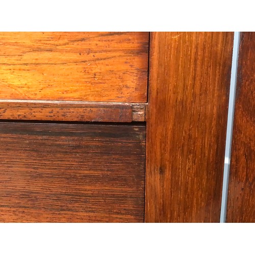 511 - A Victorian rosewood and mahogany Wellington chest, side locking mechanism, the third drawer with se... 