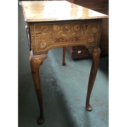 555 - An 18th century oak lowboy, all over floral marquetry, the moulded top over three frieze drawers, on... 