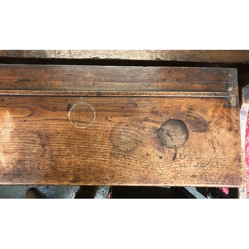 506 - An 18th century oak dresser base, three drawers over a shaped apron, on chamfered square section leg... 