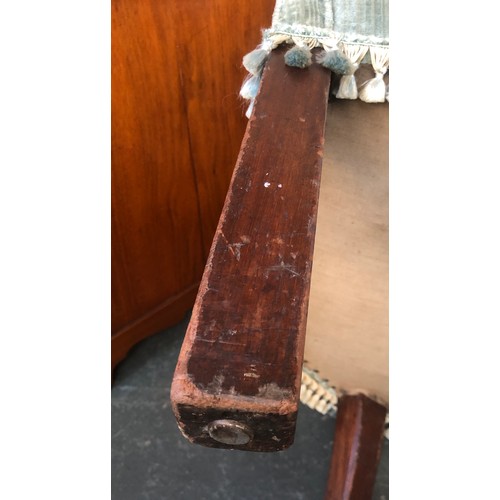 600 - A George III barrel back armchair, on square section legs (repairs), approx. 71cm wide