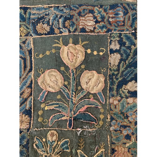 652 - A 17th century needlework tapestry table carpet, ten floral needlework slips depicting tulips, daffo... 