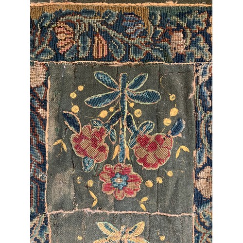 652 - A 17th century needlework tapestry table carpet, ten floral needlework slips depicting tulips, daffo... 