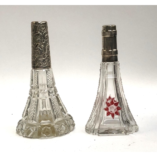 65 - Two silver collared cut glass scent bottles, the tallest 14.5cmH