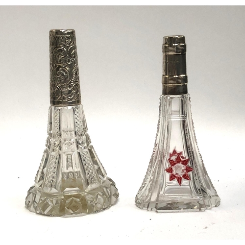 65 - Two silver collared cut glass scent bottles, the tallest 14.5cmH