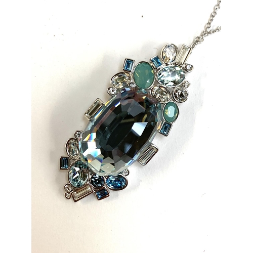 31 - A boxed Swarovski crystal necklace, the pendant 6cmL