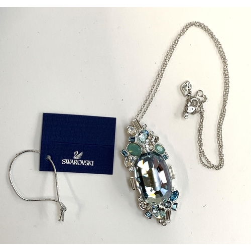 31 - A boxed Swarovski crystal necklace, the pendant 6cmL