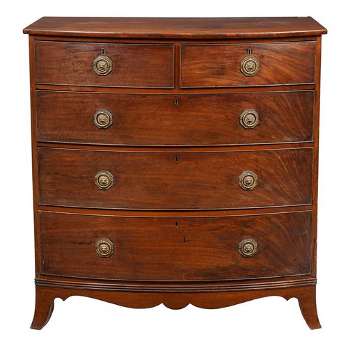 1006 - A Regency mahogany bowfront chest of two short over three long drawers, on a shaped apron and swept ... 