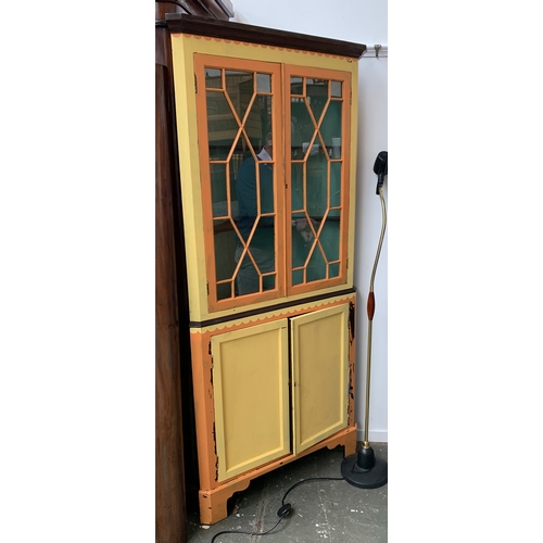 1024 - An astragal glazed painted standing corner cupboard on bracket feet, 197x90cm