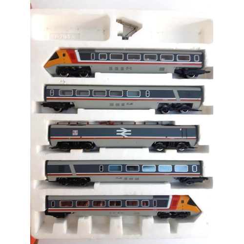 103 - A Hornby OO Gauge Advanced Passenger Train Pack, comprising 2 driving trailers, power car and 2 van ... 