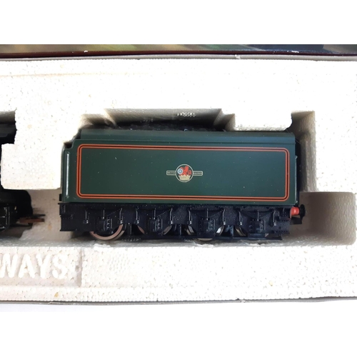 105 - A Hornby OO gauge BR 4-6-2 Class A4 locomotive and tender, 'Wild Swan', R286, boxed