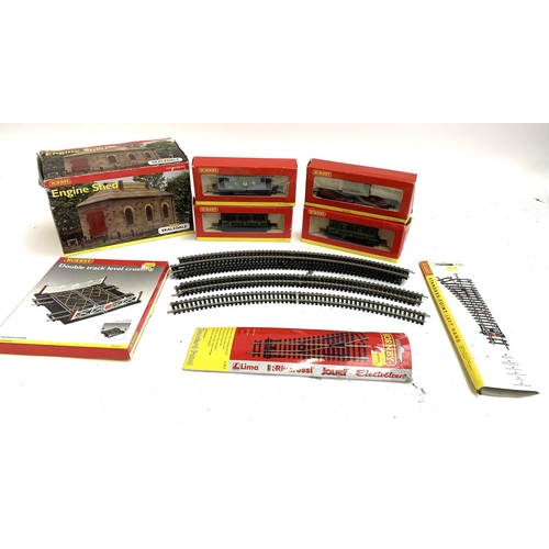 121 - Two Hornby R4135 OO Gauge Four-Wheel coaches '350', an OO Gauge ESG Machinery wagon, an LMS wagon, a... 