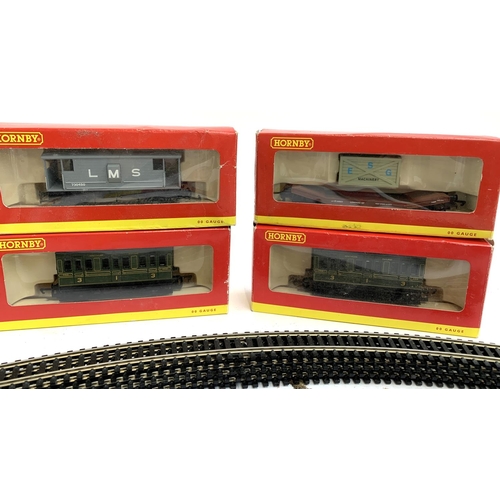 121 - Two Hornby R4135 OO Gauge Four-Wheel coaches '350', an OO Gauge ESG Machinery wagon, an LMS wagon, a... 