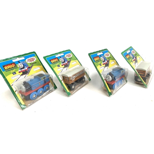 Four unopened Brio Thomas the Tank Engine & Friends wooden railway and carriages compris