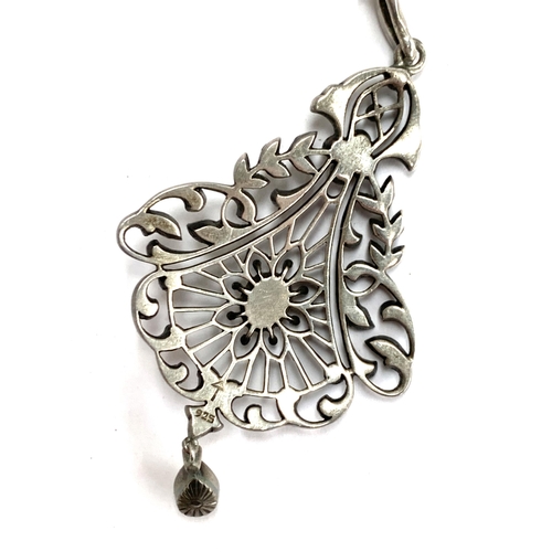 22 - A Belle Epoque silver and paste openwork lavaliar pendant on a silver chain, 6.5cmL