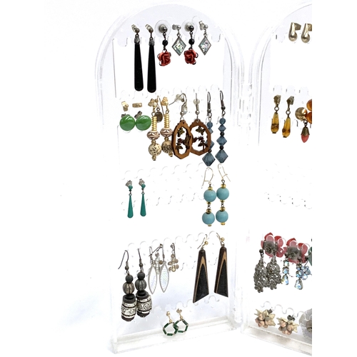 37 - A large quantity of costume earrings, some silver, approx. 47 pairs