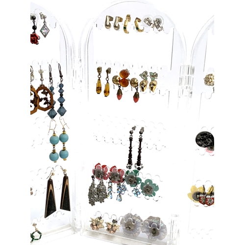 37 - A large quantity of costume earrings, some silver, approx. 47 pairs