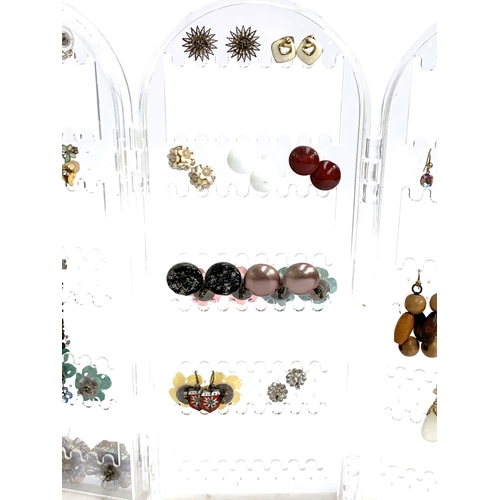 37 - A large quantity of costume earrings, some silver, approx. 47 pairs