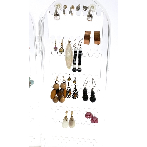 37 - A large quantity of costume earrings, some silver, approx. 47 pairs