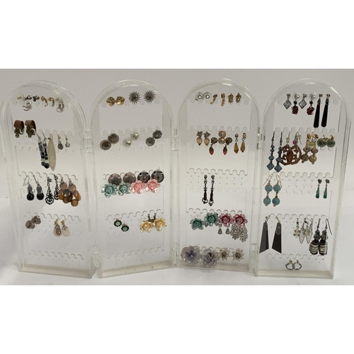 37 - A large quantity of costume earrings, some silver, approx. 47 pairs