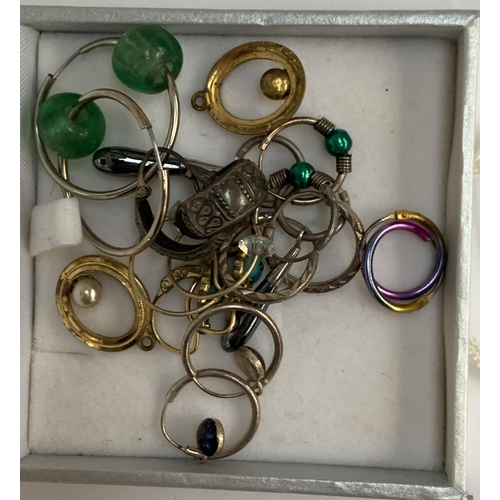 37 - A large quantity of costume earrings, some silver, approx. 47 pairs