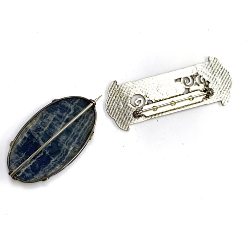 48 - An Art Deco Pierre Bex style enamel brooch, 6cmL; together with a silver and lapis brooch, 4.5cmW