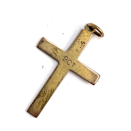 53 - A 9ct gold crucifix, 0.6g; together with scrap gold chain, tests as 14ct or higher, 2.3g