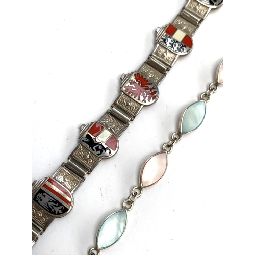 57 - A silver and mother of pearl bracelet, 6.3g, 19cmL; together with a 900 silver and enamel bracelet d... 