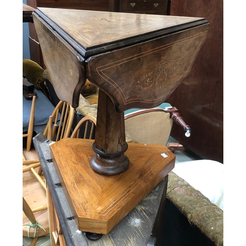 1023 - An unusual rosewood and marquetry triangular occasional table, on hexagonal tapering column and trif... 