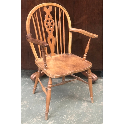 1025 - A late 19th/early 20th century ash, beech and elm wheelback Windsor chair